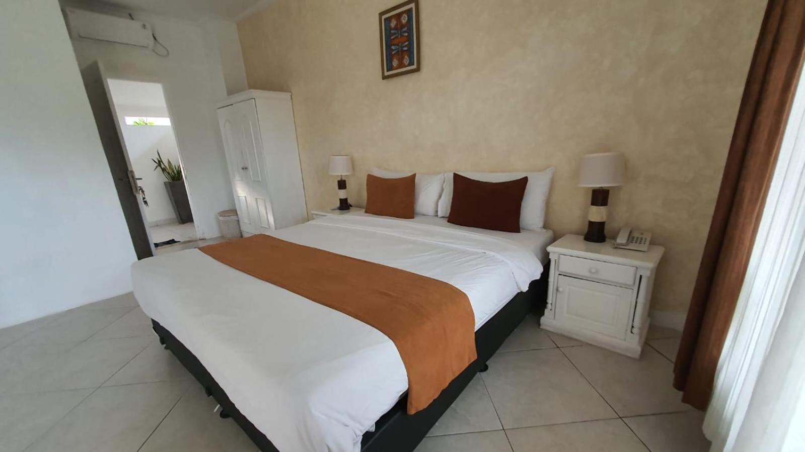 Nipuri Resort And Villas Seminyak By Kamara Bilik gambar
